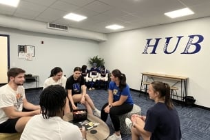 Students hang out in Widener University's mental health space for student athletes