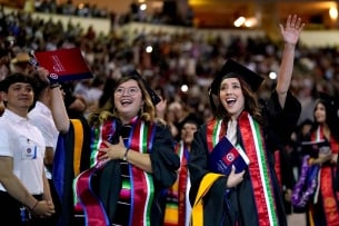 CSU Fresno Students celebrate at graduation