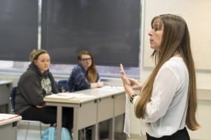 Patty Goedl, a light-skinned woman with long brown hair, teaches accounting at the University of Cincinnati at Clermont.