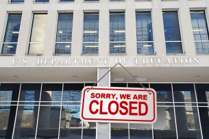 An illustration showing a closed sign hanging on the Education Department