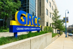 Outdoor view of campus and signage for Grand Rapids Community College