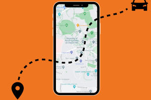 A phone screen with a map of the UNC campus traced over by a dotted line connecting a pin to a vehicle