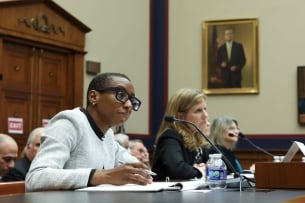Harvard president Claudine Gay, seated at a witness table in the foreground, at a Dec. 5 congressional hearing on antisemitism on campuses. Behind her former University of Pennsylvania president Elizabeth Magill can be clearly seen.