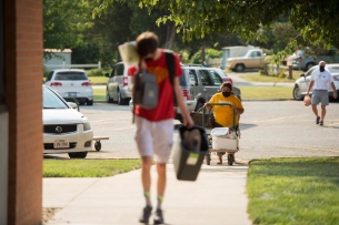 Photo of people walking on the Hesston College campus.