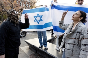 Pro-Israel and Pro-Palestine protesters counter one another.