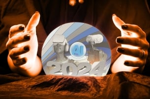 Two hands hover near a crystal ball filled with items inside, including "2024", a robot, "AI" and camera. 