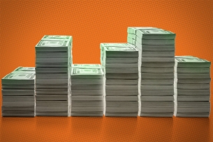 Photo illustration of piles of money.