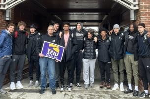 dartmouth basketball players posing with union rep