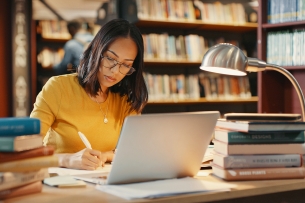 Woman studying in library