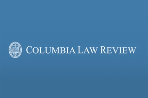 In this screenshot from the Columbia Law Review website, the words “Columbia Law Review,” in white, can be seen against a blue background, next to a logo.