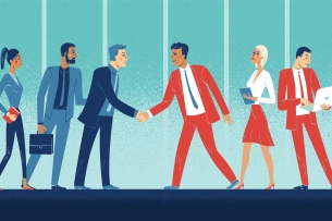 Two groups of diverse professionals meet and greet, one wearing red, the other blue