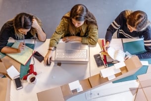 Architecture students study on their own in the classroom