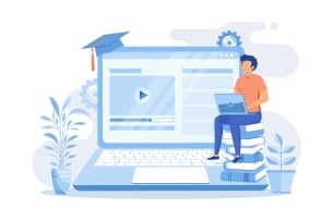 Illustration: A man sits on an oversize laptop, which has a graduation cap perched on a corner of its screen. There are plants surrounding the laptop.