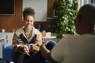 Teenage student meets with a counselor