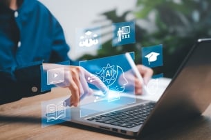 Person using laptop with AI