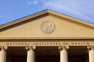 An exterior view of the main historic National Institutes of Health building in Bethesda, Md.