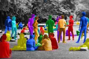 Bright multicolored images of students interact on a campus quad.