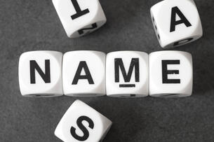 The word "name" is spelled out on cubes.
