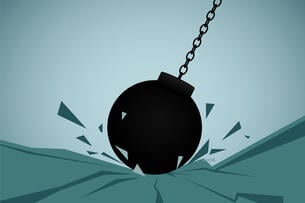 An illustration of a wrecking ball hitting ground.