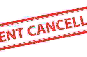 A red stamp on a white background that says "Event Cancelled."