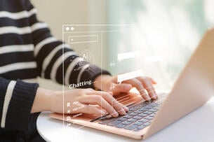 Woman using computer chatting with an artificial intelligence asks for the answers wants