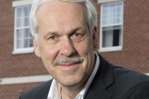 Paul LeBlanc, a light-skinned man with white hair and a gray mustache