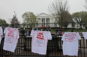 White T-shirts hang on a clothesline near the White House as part of a Title IX awareness campaign.