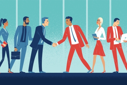 Two groups of diverse professionals meet and greet, one wearing red, the other blue