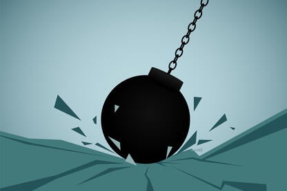 An illustration of a wrecking ball hitting ground.