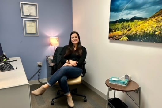 Hannah Nunez sitting in an office
