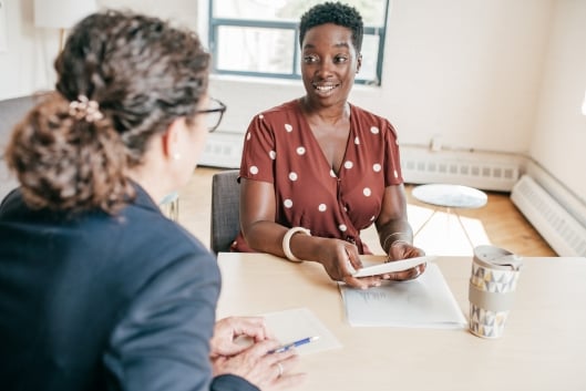 A student meets with a mentor