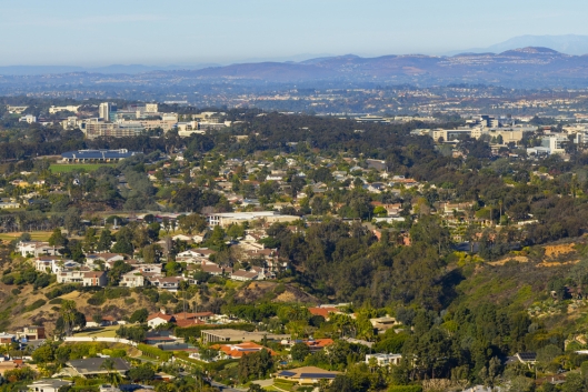 Panoramic view of the University of California, San Diego, campus with the ocean in the background.
