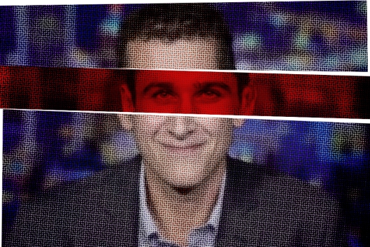 A photo of Richard Hanania with a red bar across his eyes. 