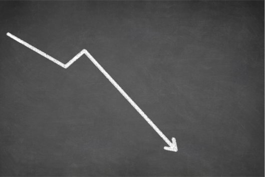 A white line graph against a black background depicting a sharply downward trend.