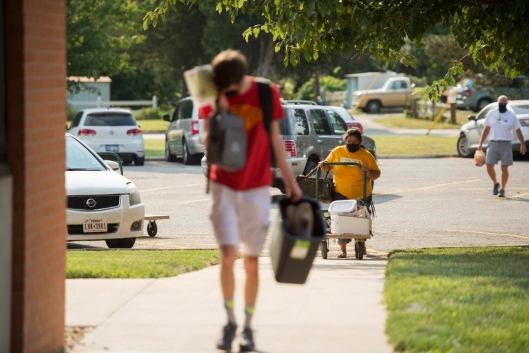 Photo of people walking on the Hesston College campus.