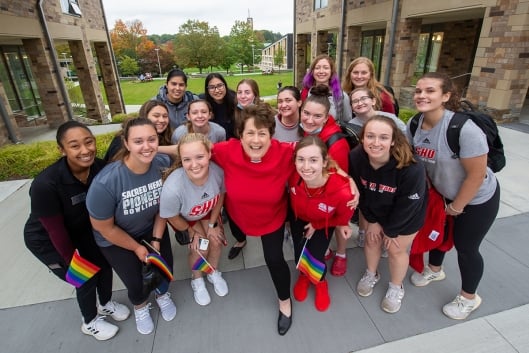 Students and a chaplain at Sacred Heart University   