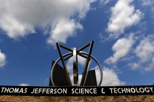 The front of a Virginia high school with an abstract scultpure
