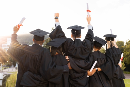 A group of graduates celebrating