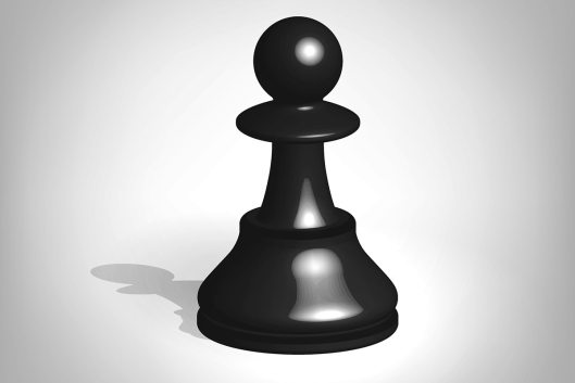 A single black chess pawn against a gray background.