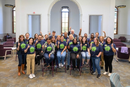 Faculty and staff at the University of Notre Dame wear their first-generation T-shirts