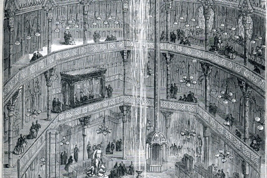 A drawing illustrating the concept of the panopticon, a design concept for prisons featuring a central watchtower from which guards can see into all the cells, but the prisoners can't see if they are being watched.