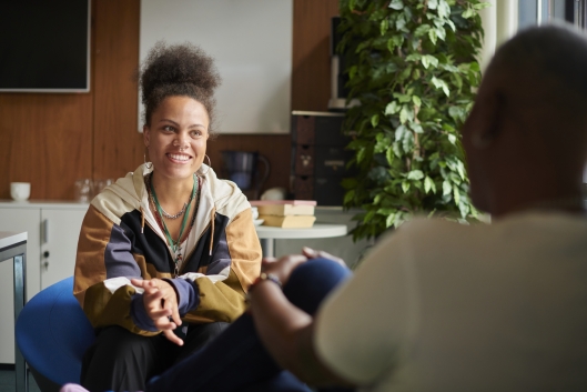 Teenage student meets with a counselor