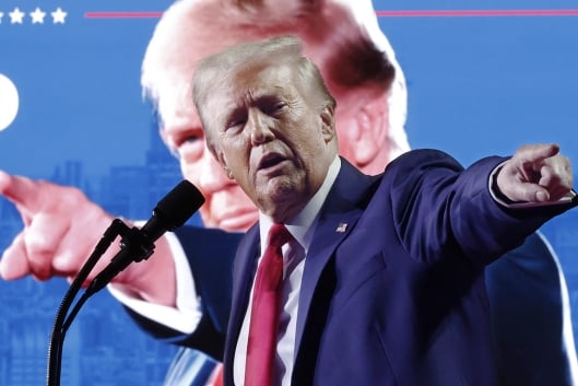 Republican presidential nominee, former president Donald Trump, speaks during a campaign rally at Van Andel Arena on Nov. 5, 2024, in Grand Rapids, Mich.