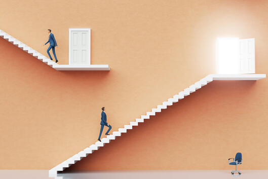 Businessman walking up stairs. Abstract environment with stairs and doors of opportunities, representing professional career, financial growth, ability, success. - stock photo