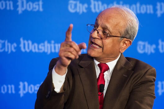 A photo of Sonny Ramaswamy at a speaking event.
