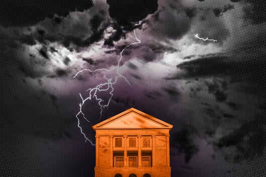 A storm whirls around a college building.