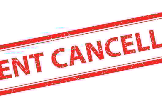 A red stamp on a white background that says "Event Cancelled."