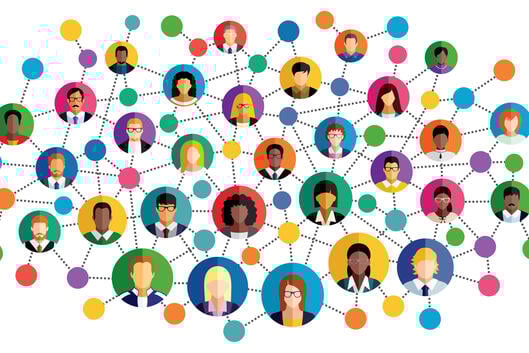 An illustration featuring circles with diverse human faces all linked together via a large network.