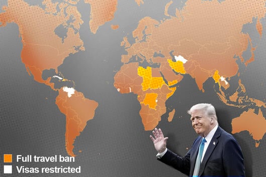President Donald Trump in front of a map of the world.