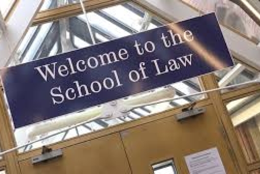 A banner proclaims, "Welcome to the School of Law"